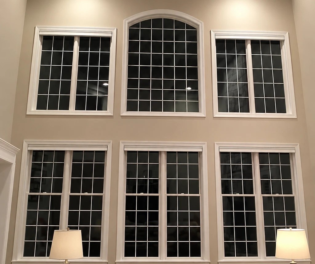 Two-story wall of windows with no coverings