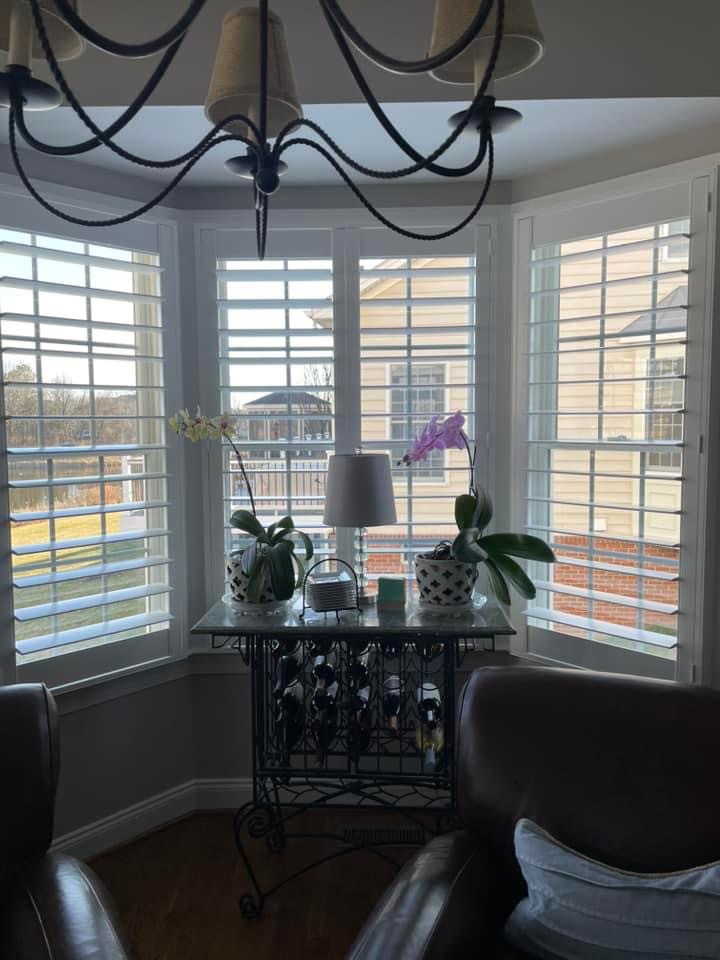 Bay window shutters seen from inside the room